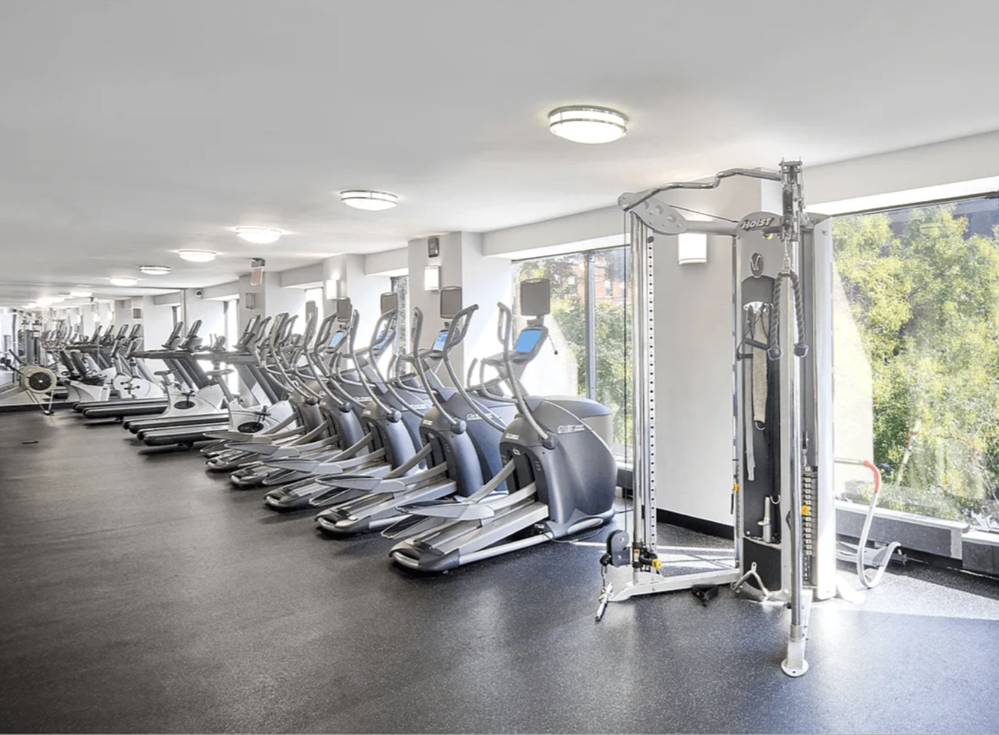 40 Harrison Street, Unit 24H Manhattan, NY 10013 - Photo 8 of 17 a view of a room with gym equipment