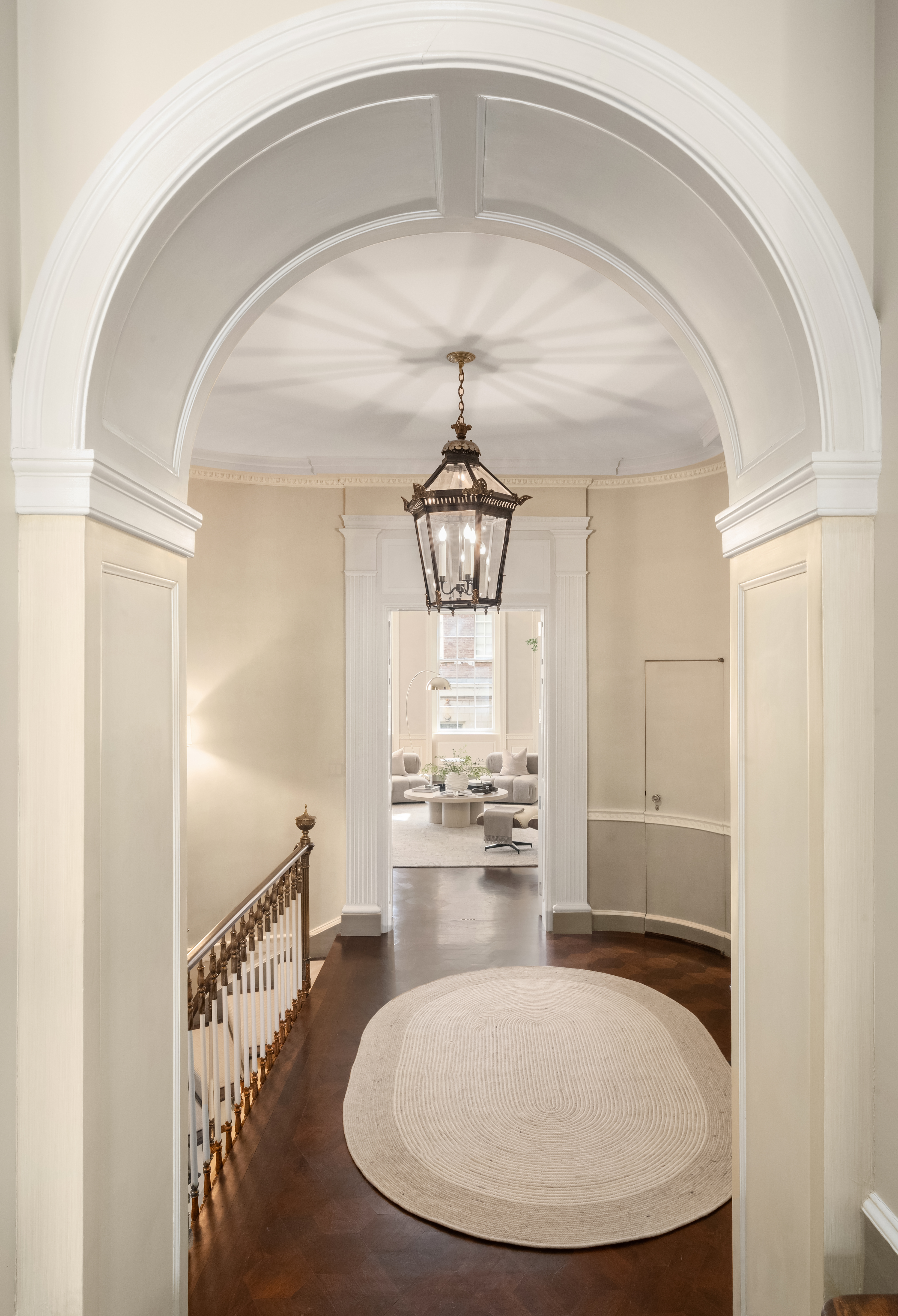 46 East 71st Street Manhattan, NY 10021 - Photo 11 of 27 a view of a livingroom with wooden floor windows and entryway
