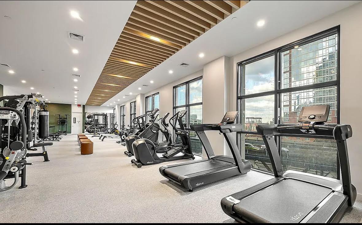 69 Adams Street, Unit 20A Brooklyn, NY 11201 - Photo 8 of 14 a view of a room with gym equipment