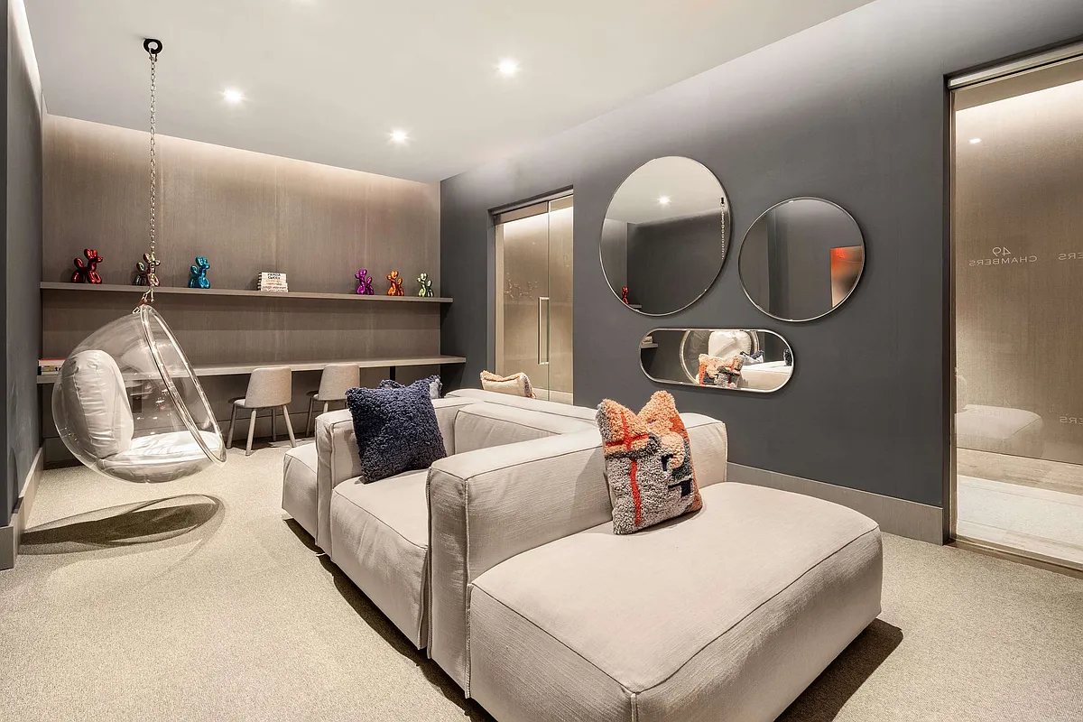 49 Chambers Street, Unit 9G Manhattan, NY 10007 - Photo 21 of 28 a living room with furniture