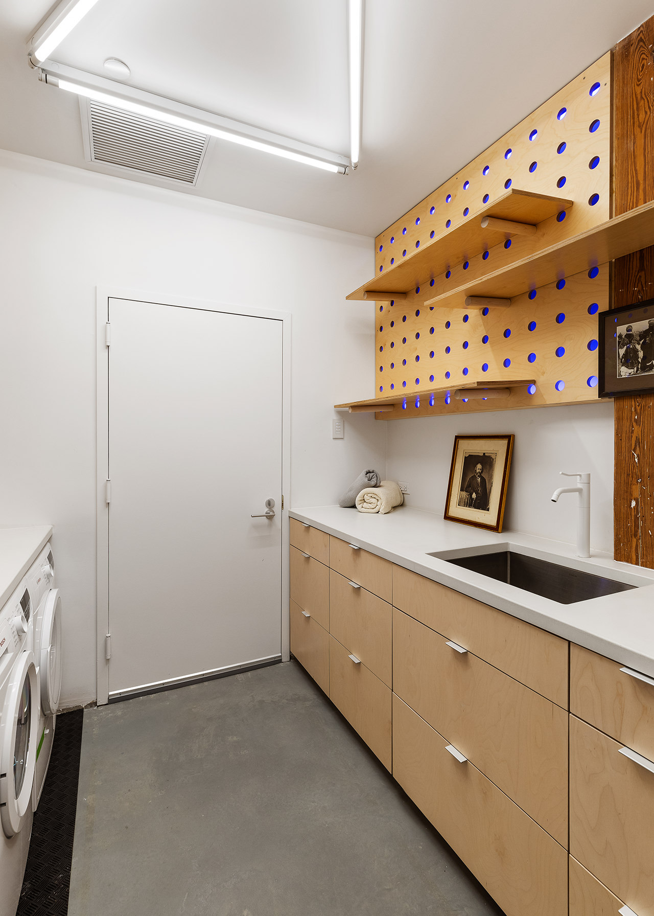 66 Washington Avenue, Unit 2 Brooklyn, NY 11205 - Photo 9 of 12 a utility room with cabinets washer and dryer