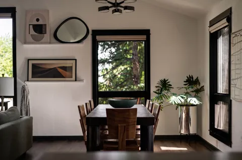 a kitchen with stainless steel appliances granite countertop a stove and a refrigerator