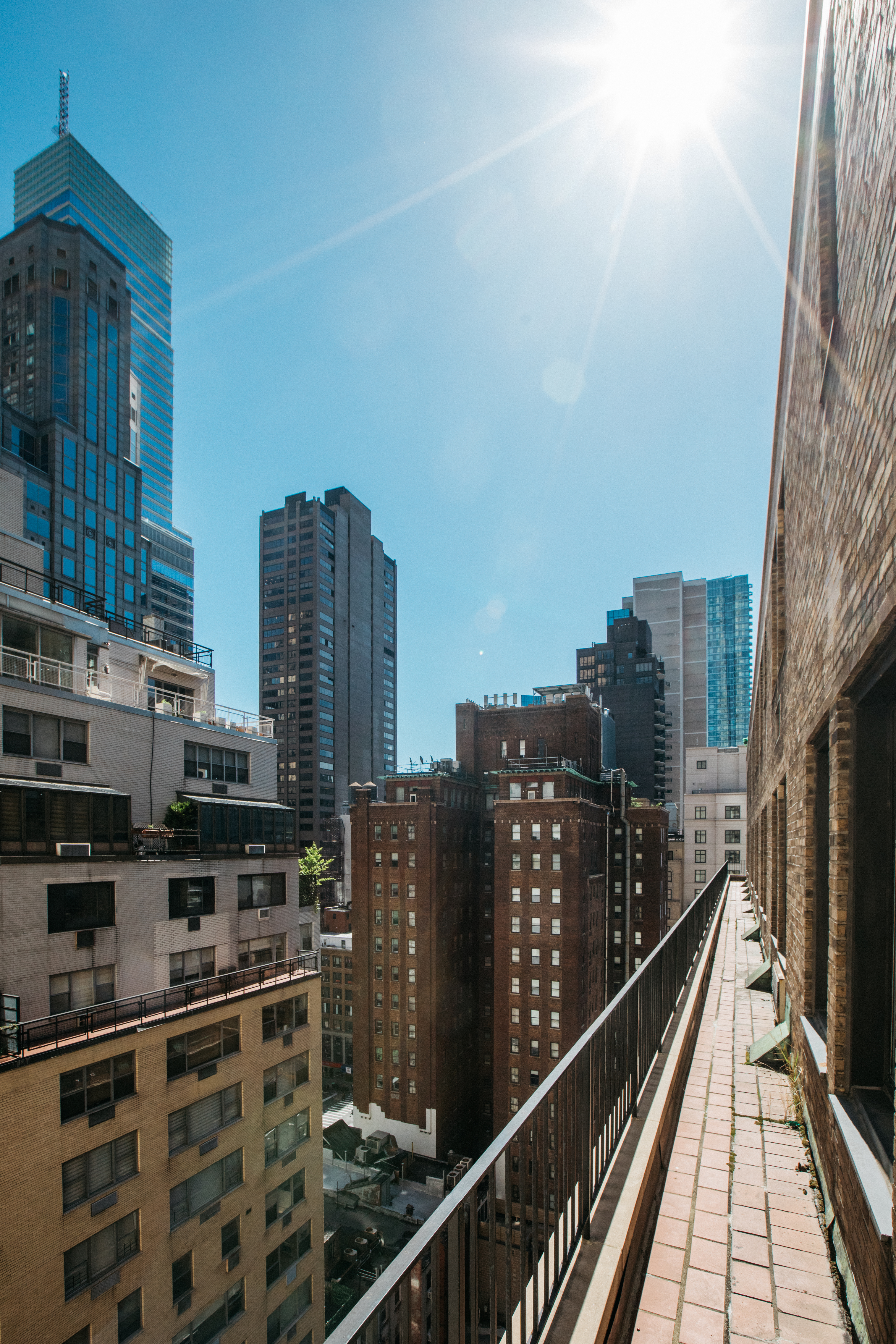111 East 56th Street, Unit 1705 Manhattan, NY 10022 - Photo 10 of 12 a city view with tall buildings