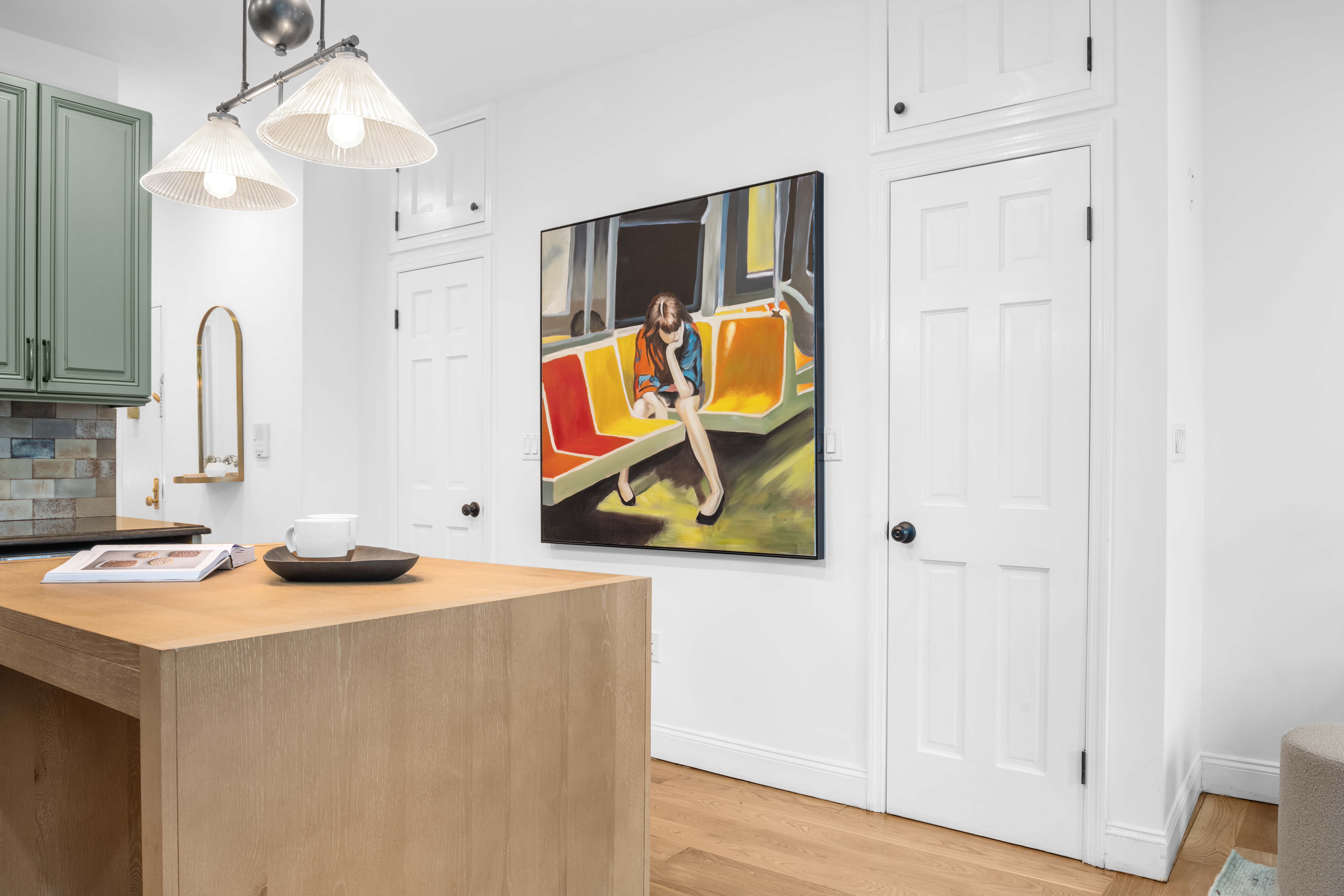131 Thompson Street, Unit 6F Manhattan, NY 10012 - Photo 6 of 9 a bathroom with a granite countertop sink and a mirror