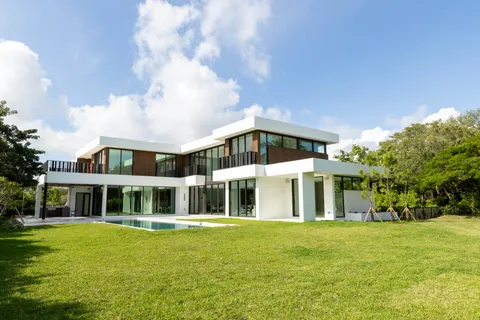 a front view of building with yard