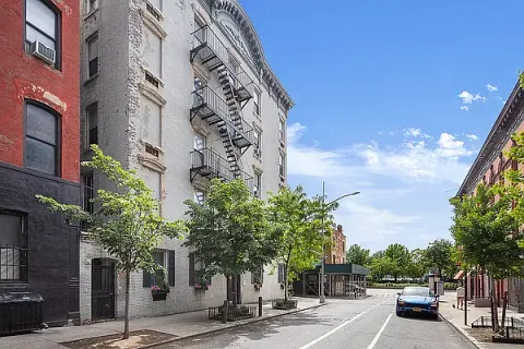 a view of a city street from a building