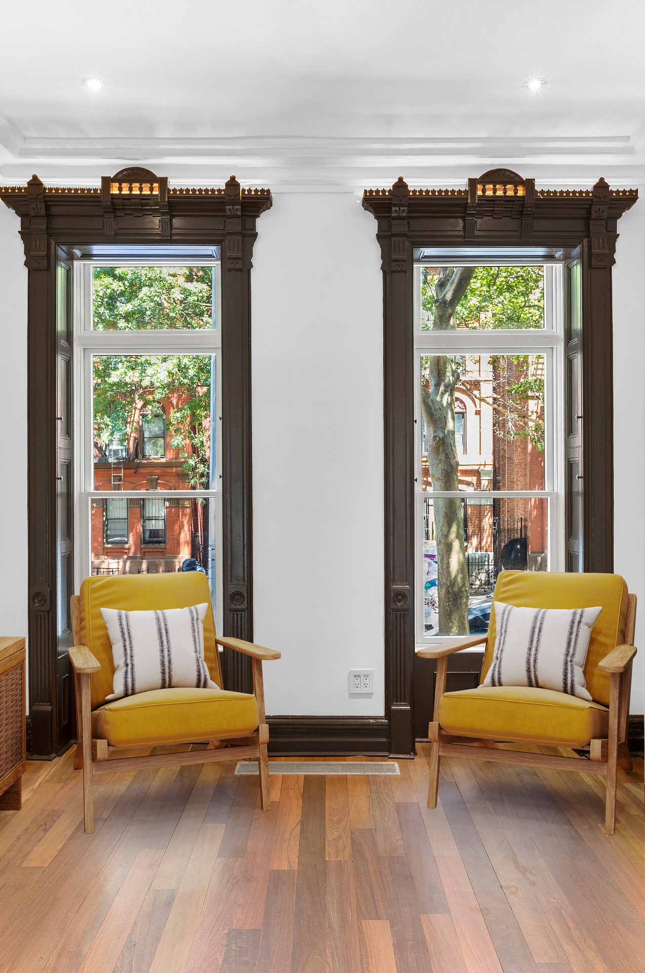 64 Clifton Place Brooklyn, NY 11238 - Photo 3 of 22 a living room with furniture and a large window