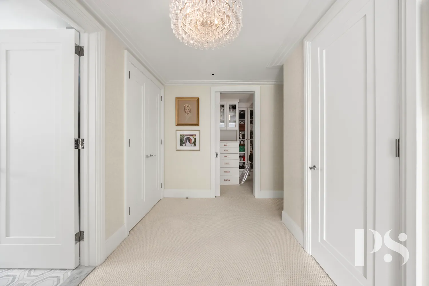 a view of empty room with a window and a kitchen