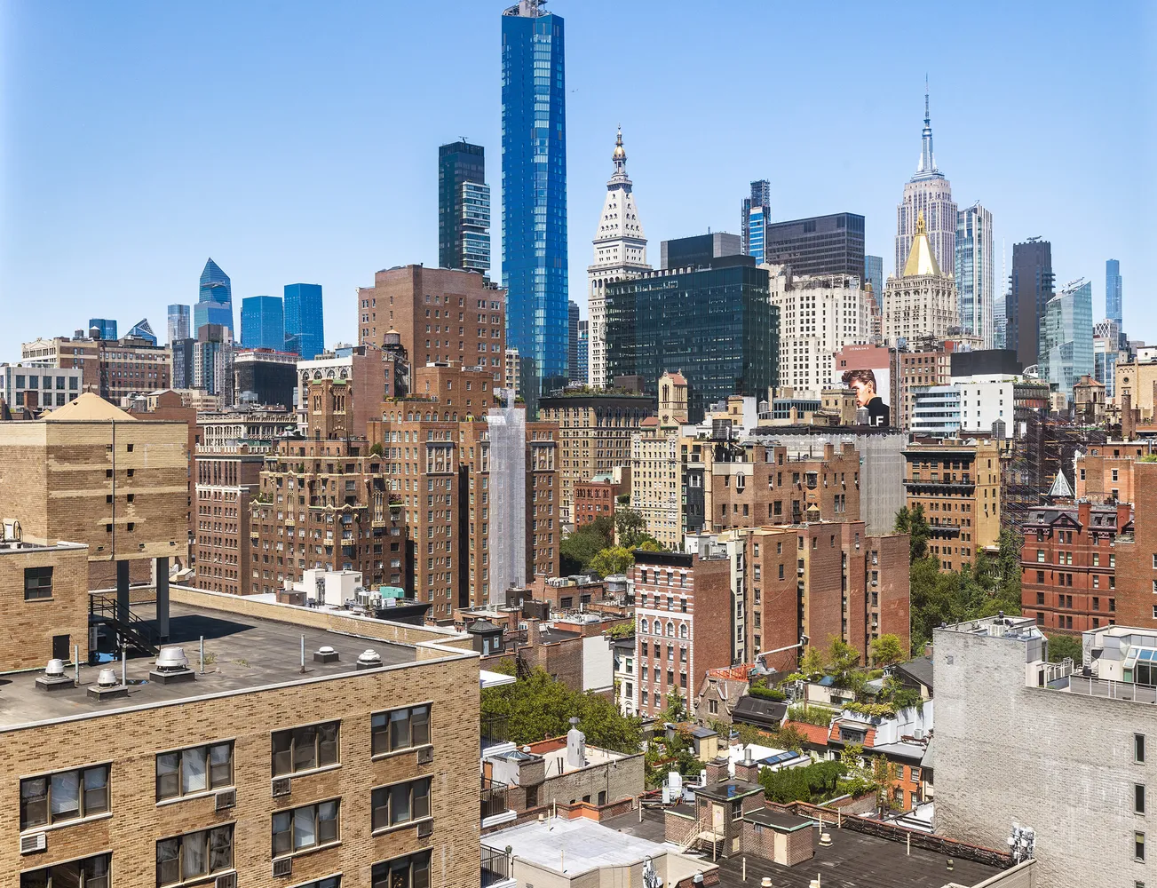 a view of city with tall buildings