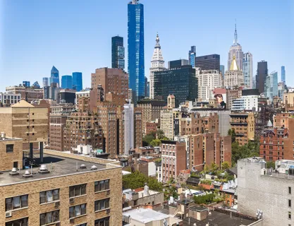 a view of city with tall buildings