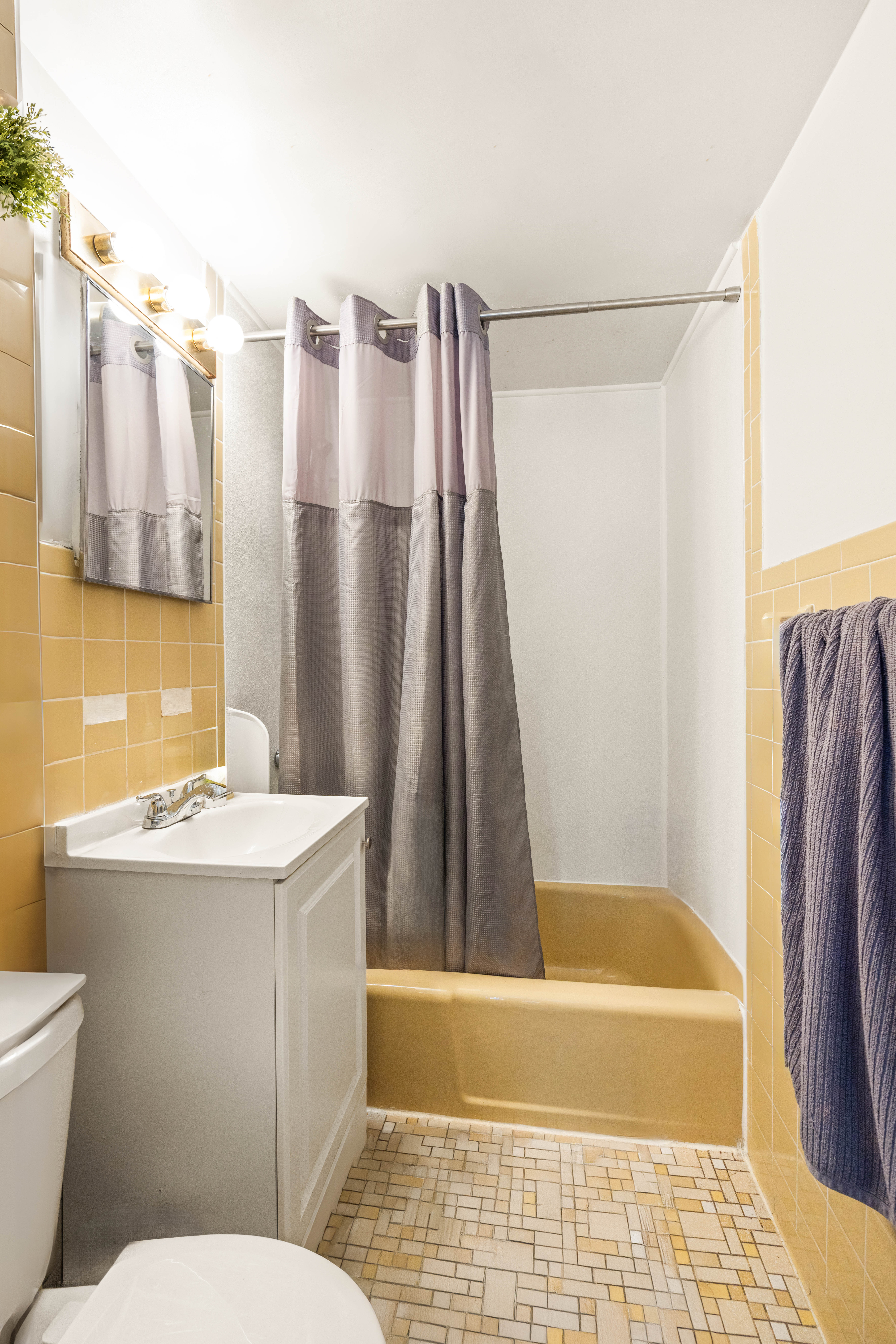 192-194 Union Street Brooklyn, NY 11231 - Photo 32 of 37 a bathroom with a sink a toilet a mirror and shower