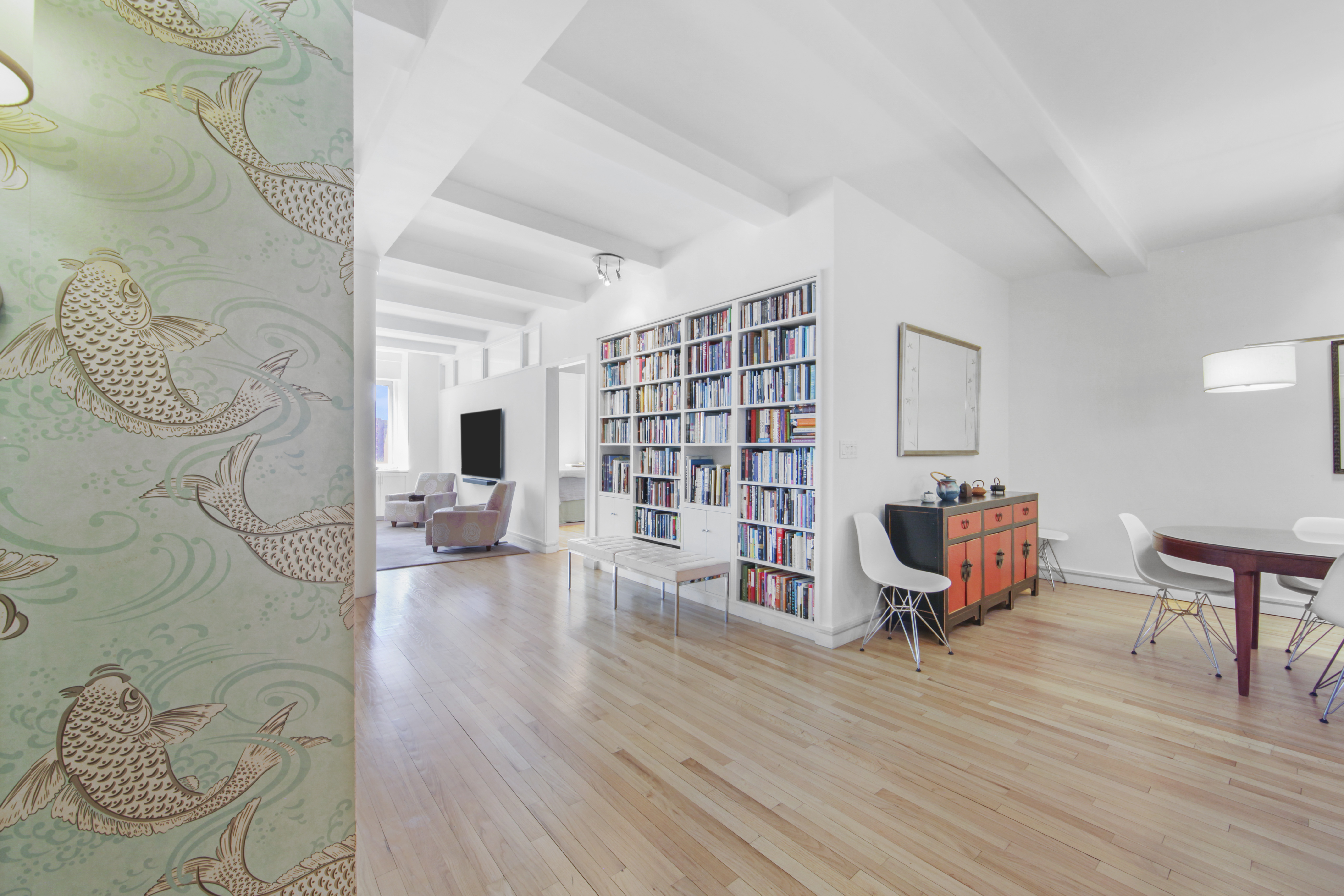 18 East 12th Street, Unit 7BC Manhattan, NY 10003 - Photo 8 of 26 a living room with furniture and a wooden floor