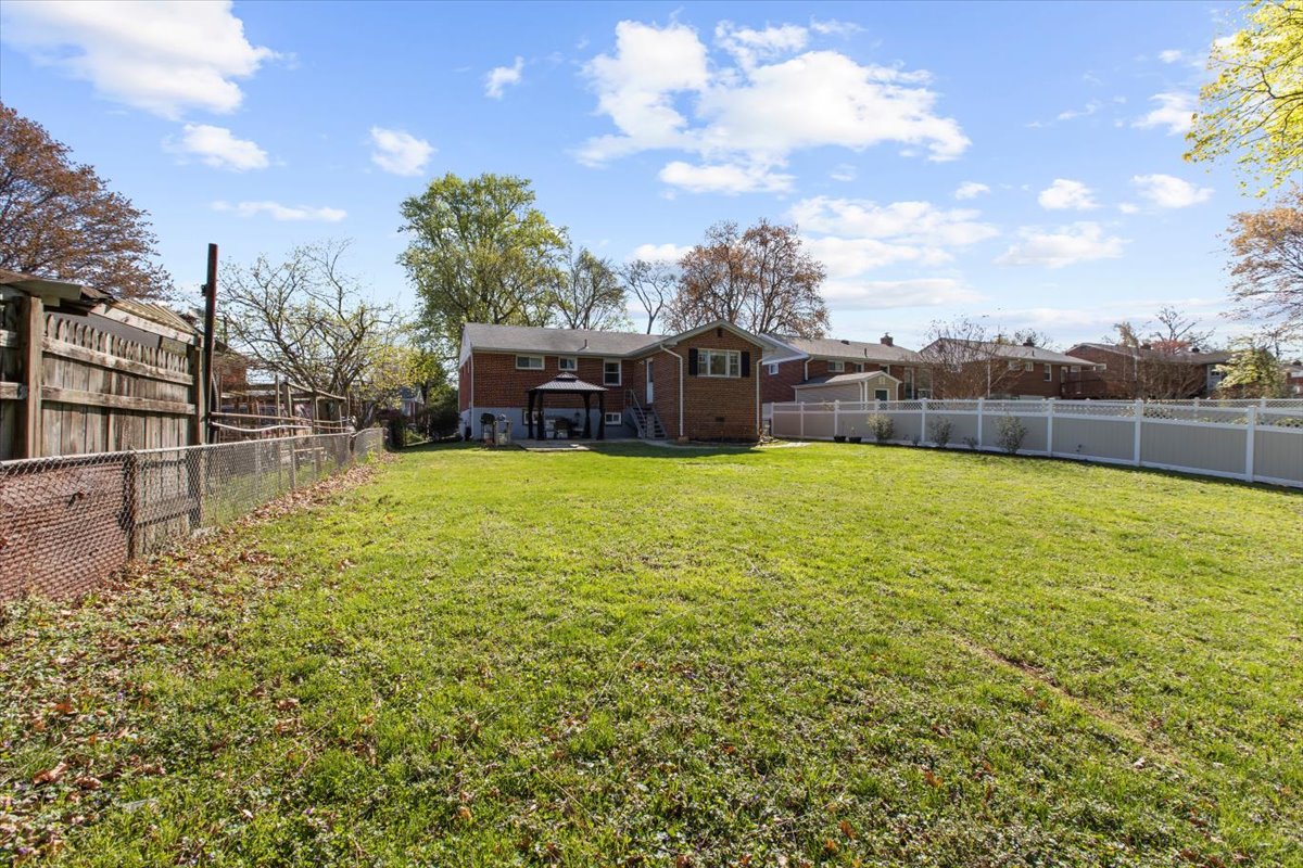 12712 Atherton Drive Silver Spring, MD 20906 - Photo 36 of 40 a view of a lake with a house in the background
