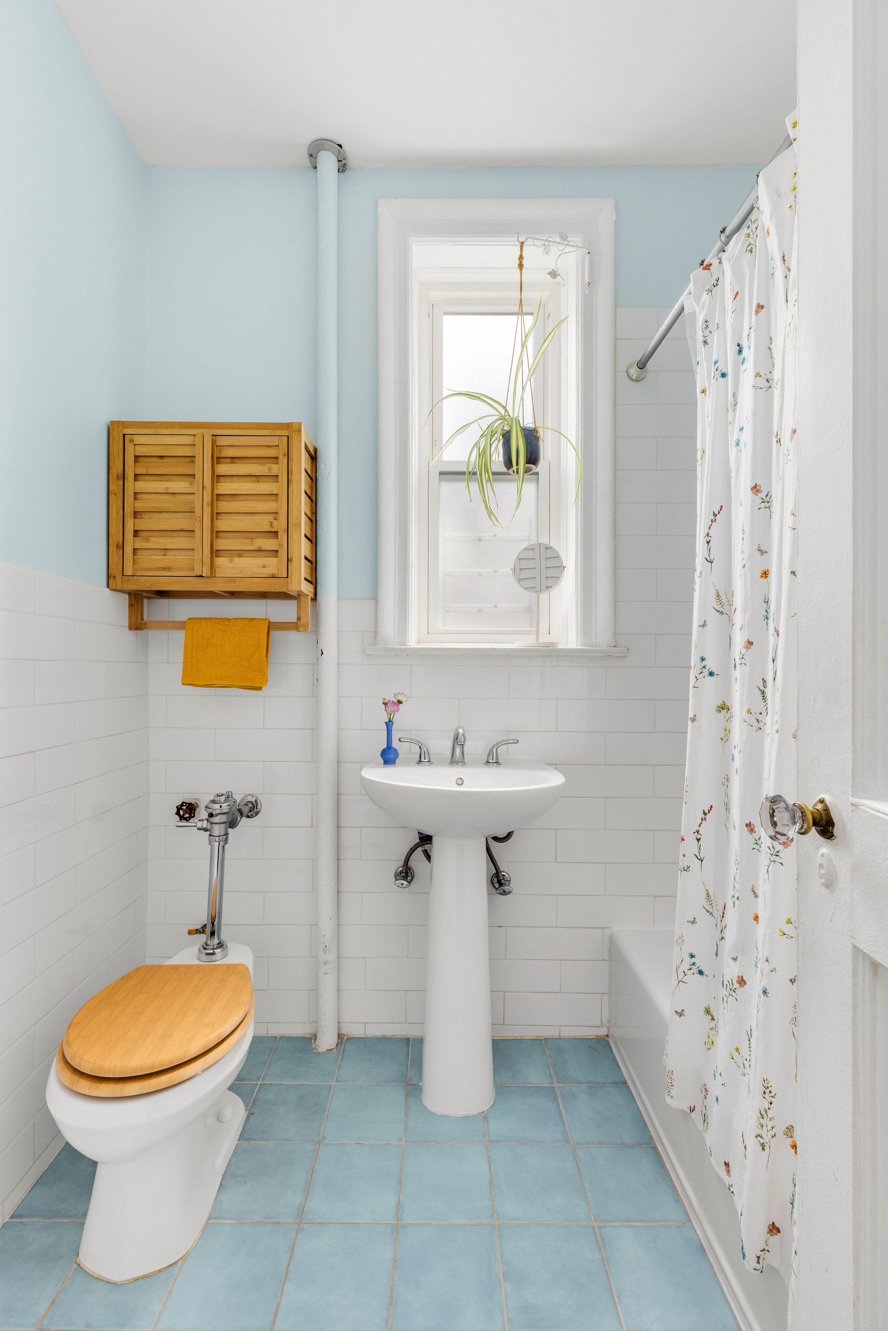 765 42nd Street, Unit 20 Brooklyn, NY 11232 - Photo 9 of 10 a bathroom with a sink a toilet and bathtub