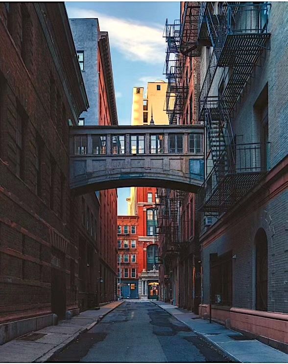 a view of a building with a street