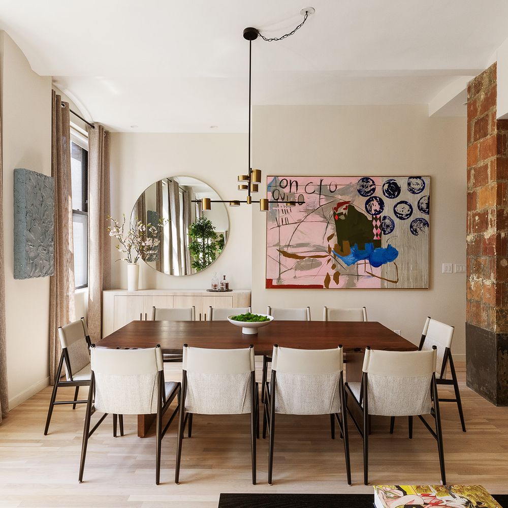 a view of a dining room with furniture and window