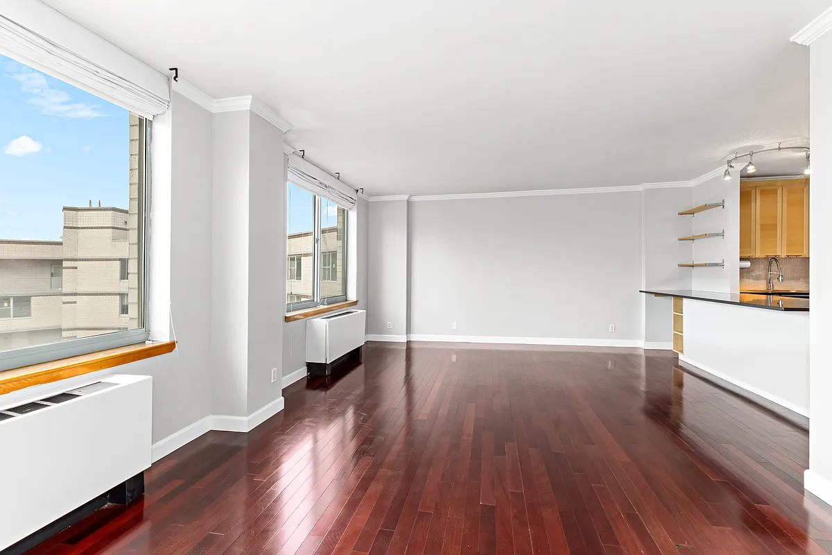 21 South End Avenue, Unit PH2BB Manhattan, NY 10280 - Photo 3 of 5 a view of a kitchen with wooden floor and electronic appliances