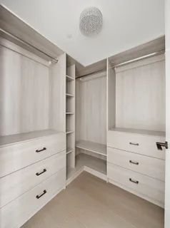 a view of an empty walk in closet