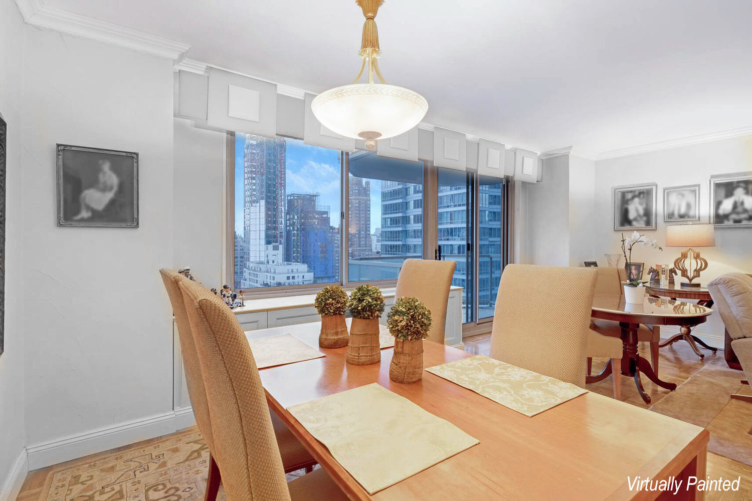 300 East 74th Street, Unit 18E Manhattan, NY 10021 - Photo 2 of 10 a view of a dining room with furniture and wooden floor