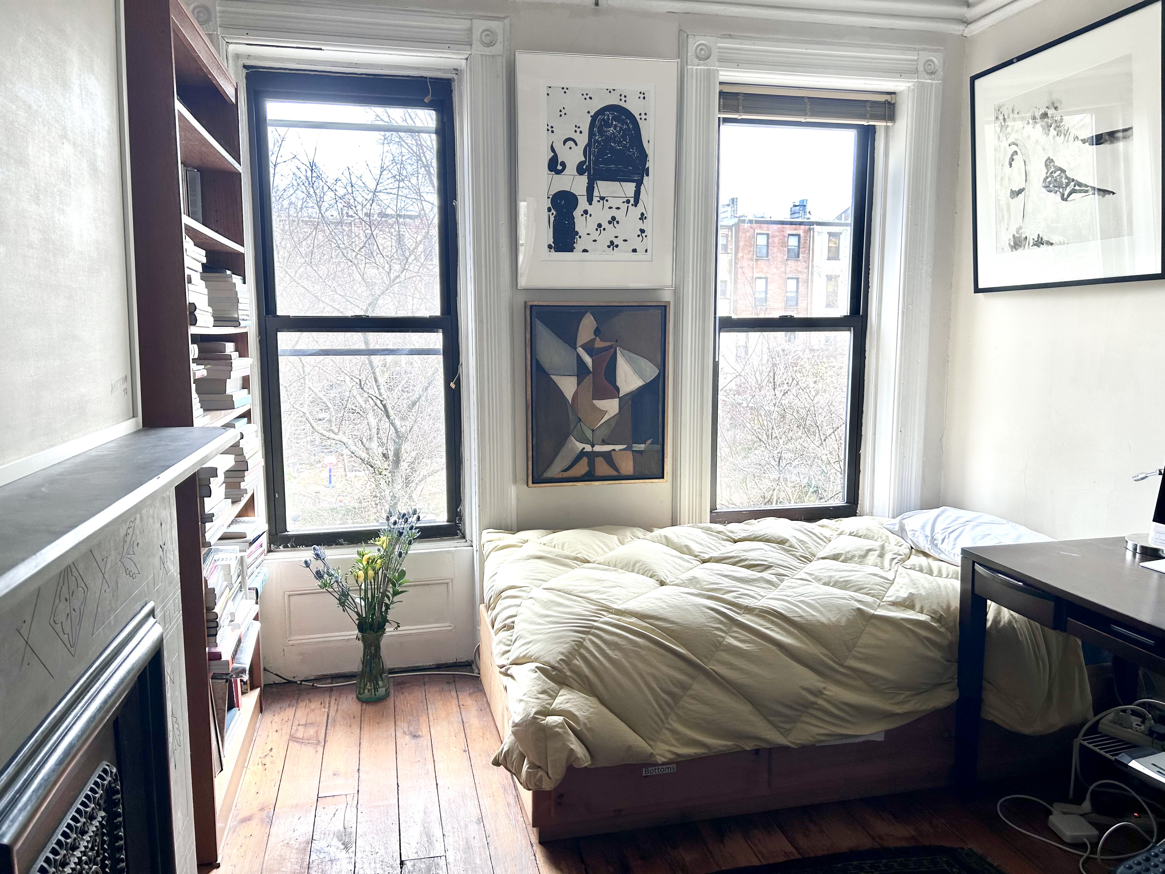 173 Garfield Place Brooklyn, NY 11215 - Photo 12 of 14 a bedroom with a bed and a window