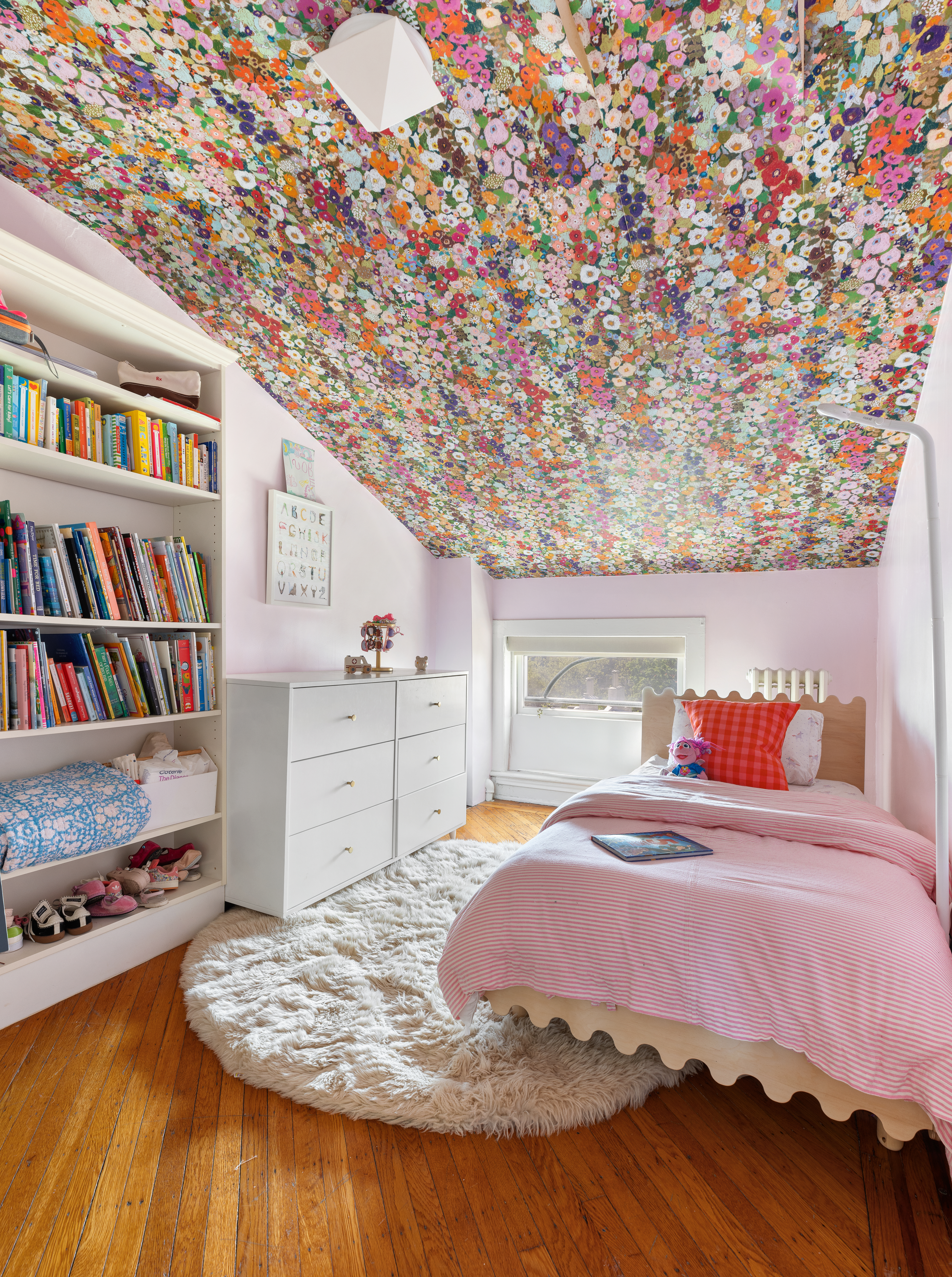 266 Henry Street, Unit B Brooklyn, NY 11201 - Photo 11 of 17 a bedroom with a bed and a book shelf