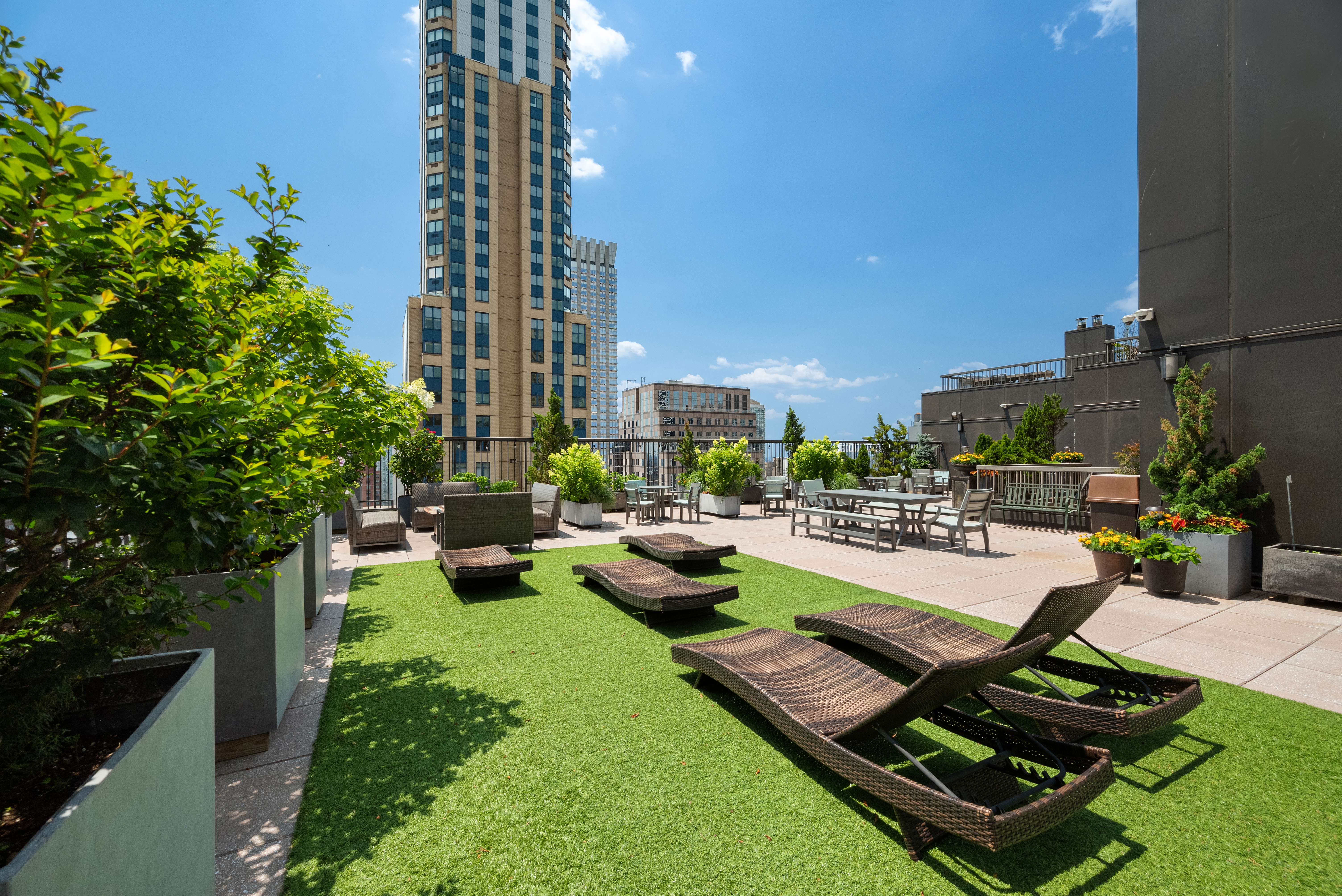 445 5th Avenue, Unit 26C Manhattan, NY 10016 - Photo 10 of 11 a view of a backyard with sitting area and garden