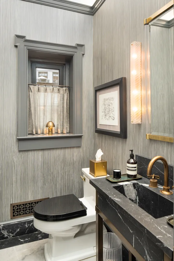 a kitchen with a sink and a stove top oven