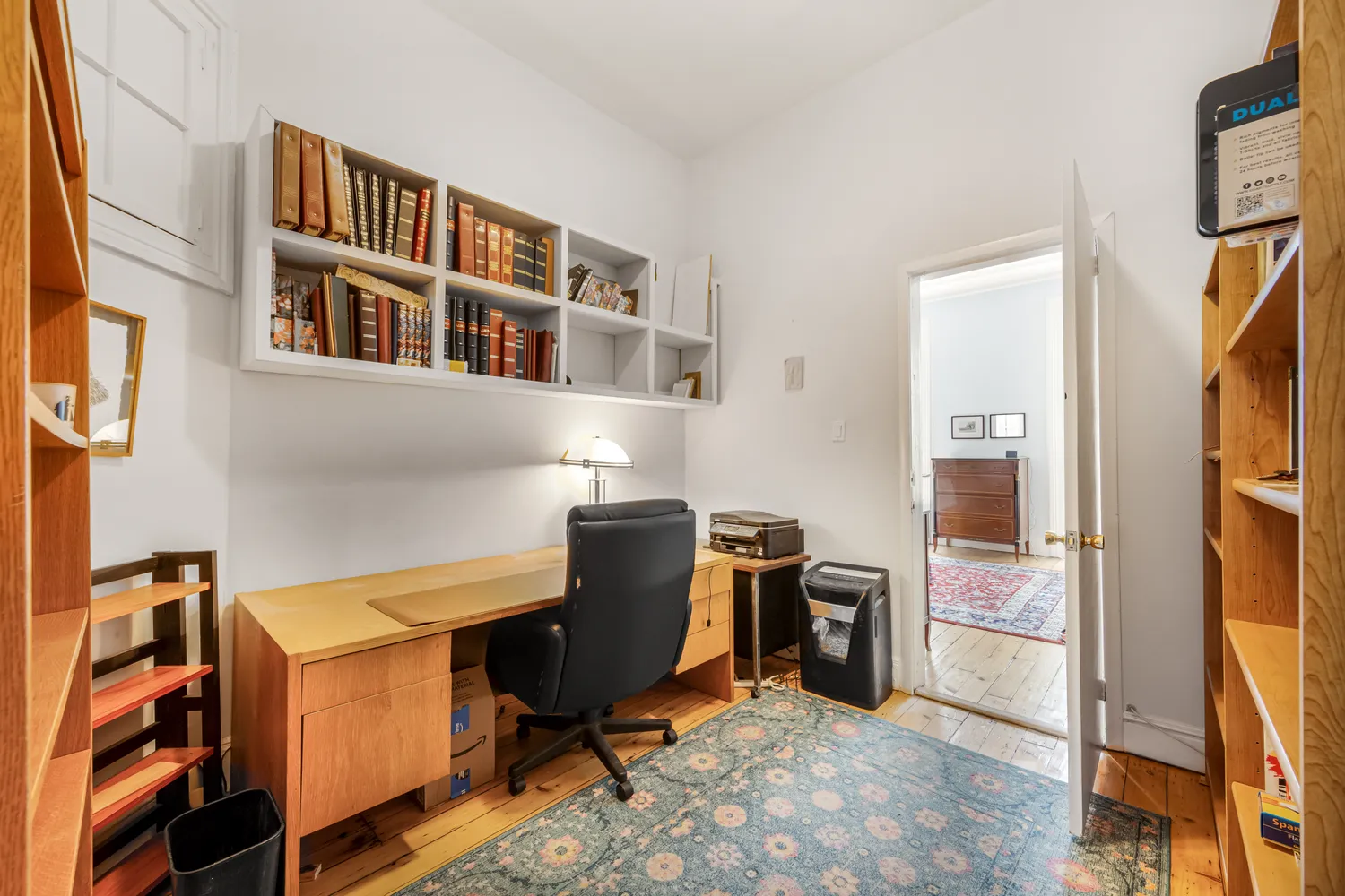 a workspace with furniture and a window