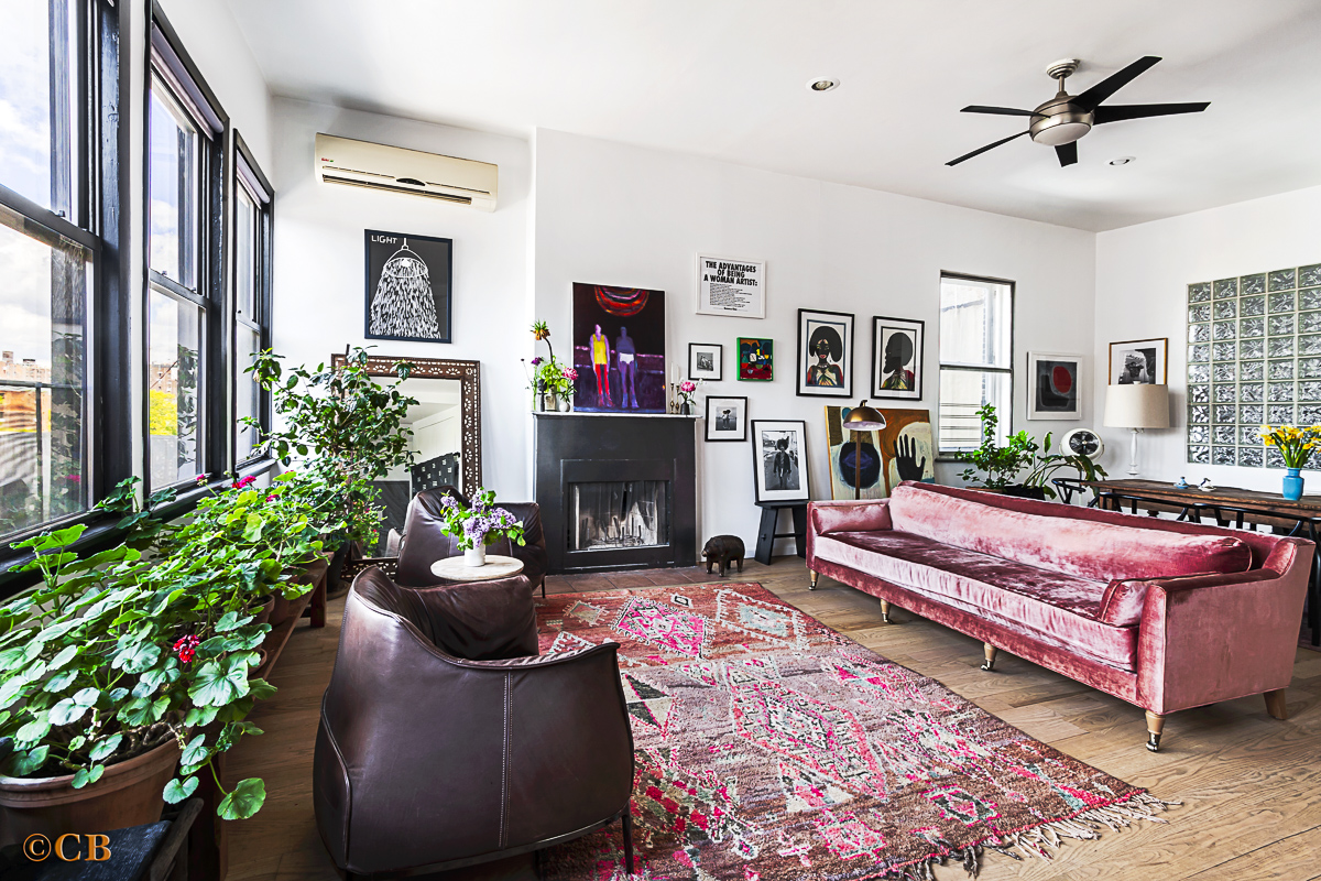 159 Carlton Avenue, Unit 4A Brooklyn, NY 11205 - Photo 1 of 9 a living room with furniture fireplace and a large window