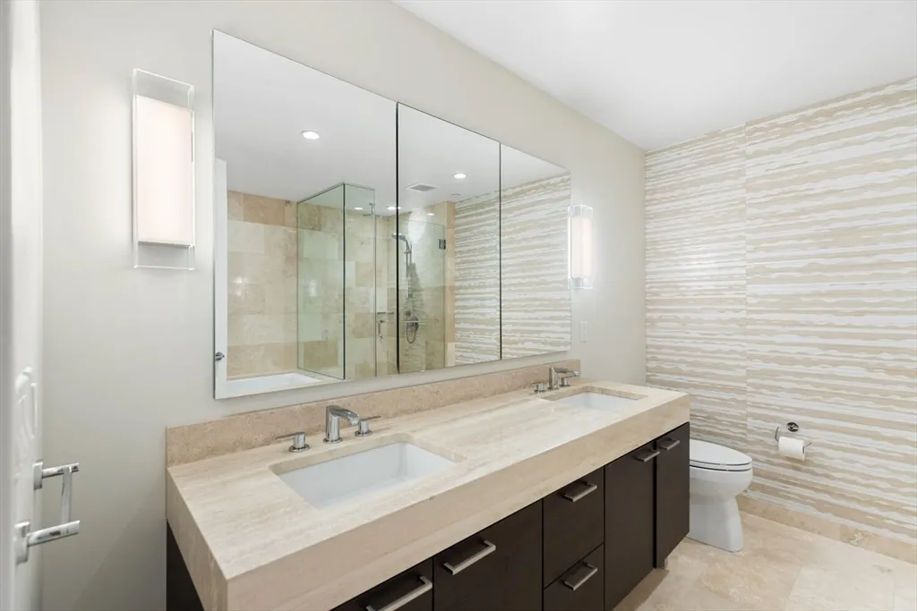 a view of a hallway with washer and dryer