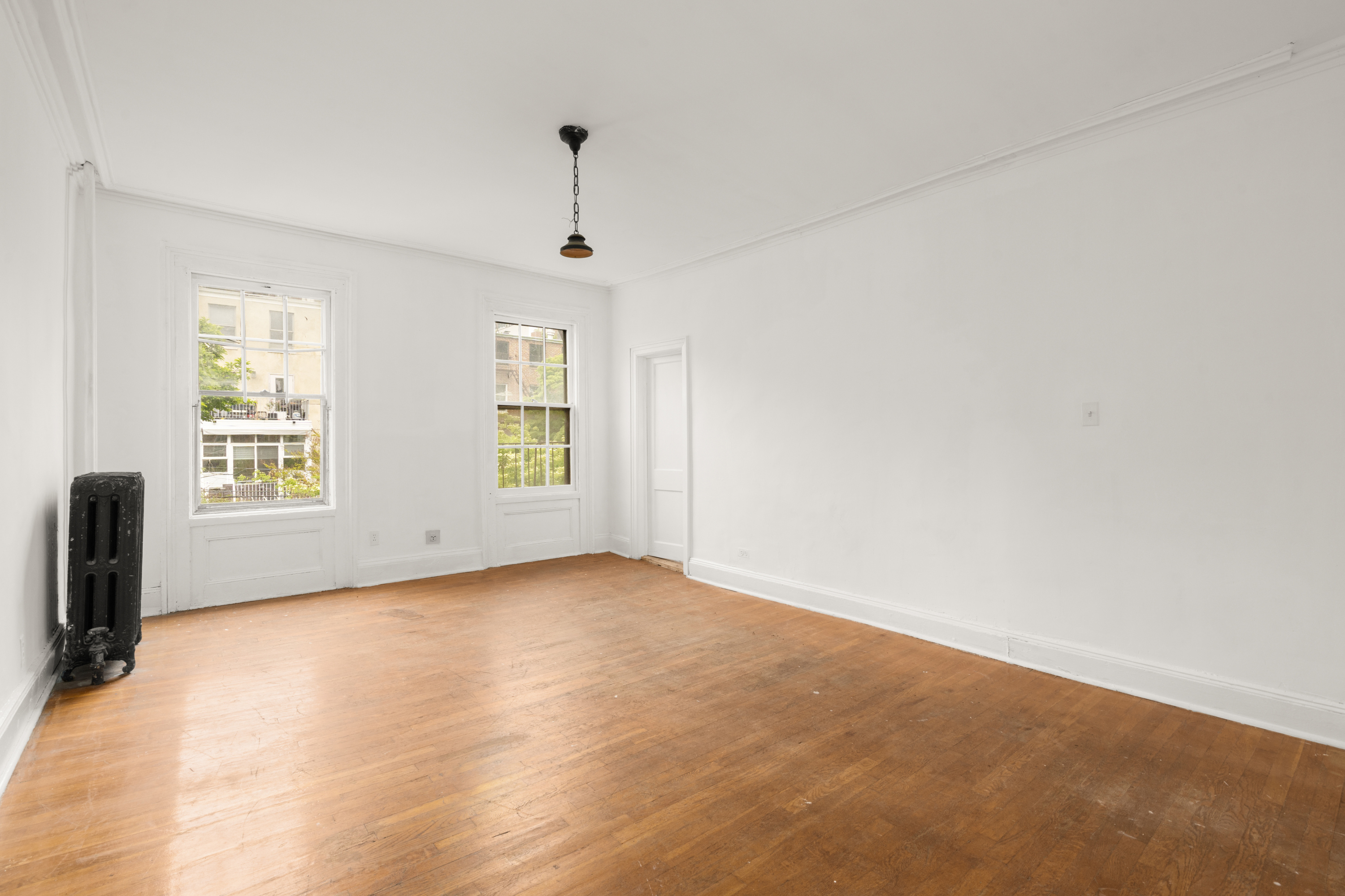 217 Dean Street Brooklyn, NY 11217 - Photo 13 of 26 a view of an empty room with a window