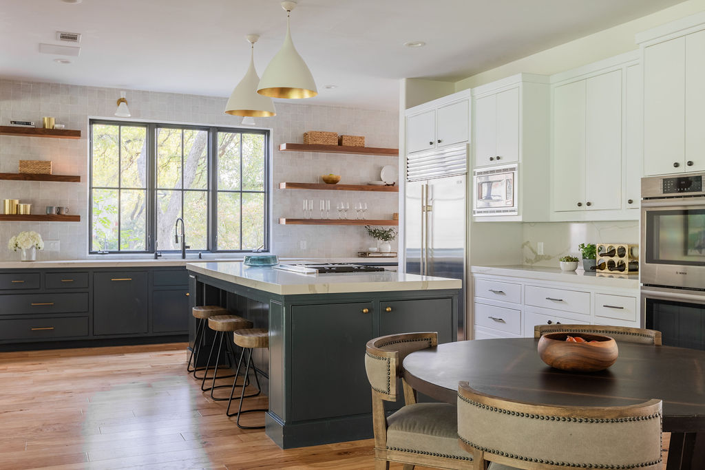 400 Inwood Road Austin, TX 78746 - Photo 14 of 43 a kitchen with a stove a sink and a window