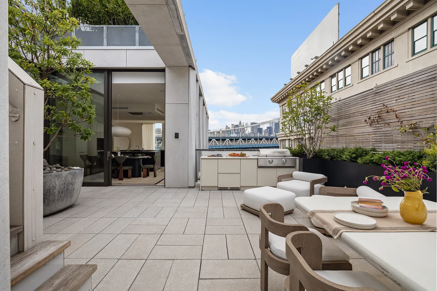 a view of a patio with table and chairs potted plants with bedroom view