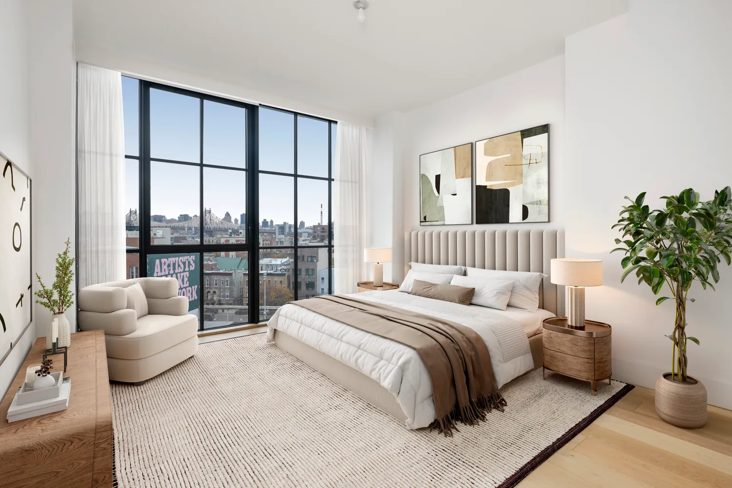 a spacious bedroom with a bed and a couch next to a window