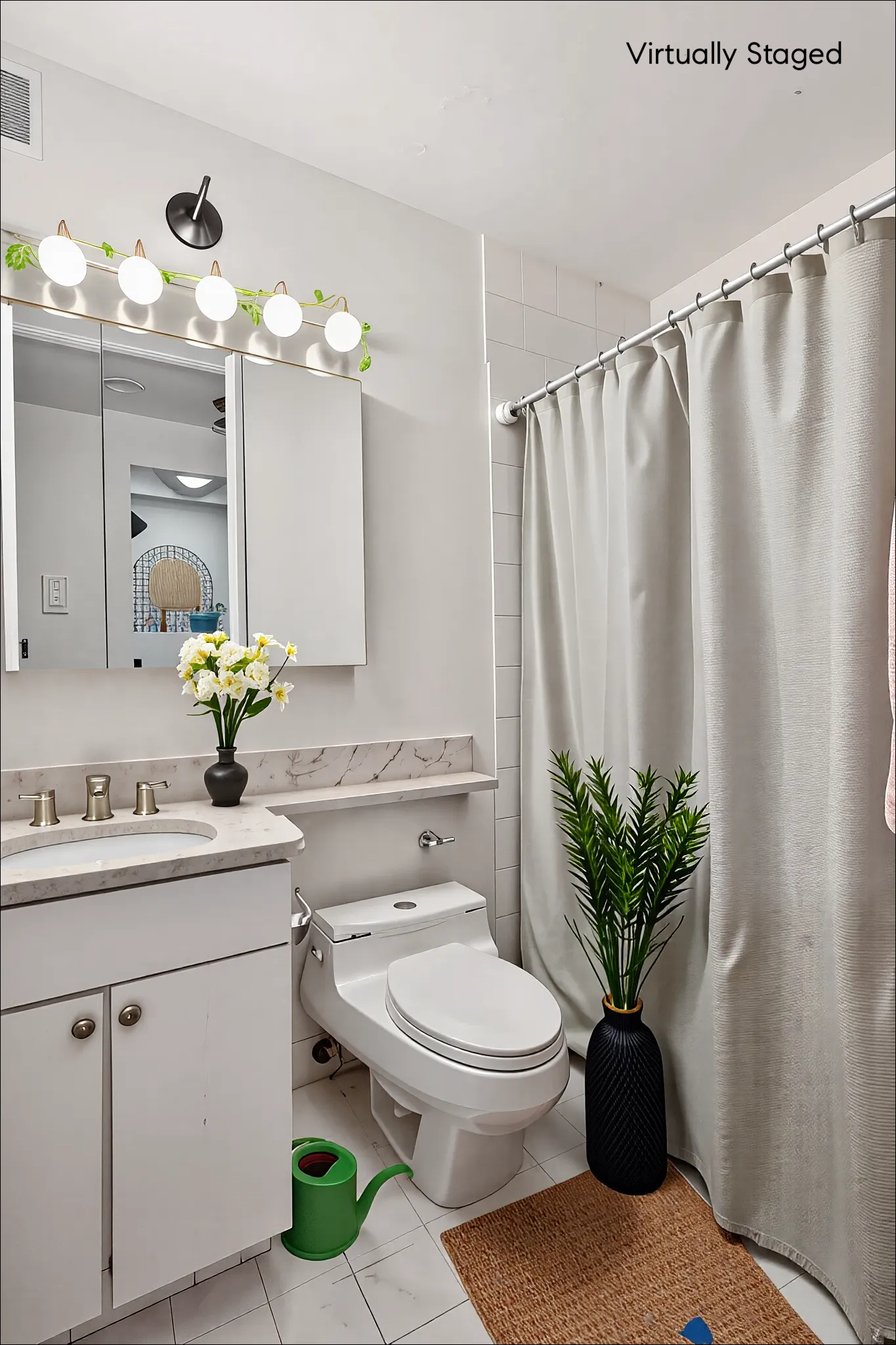 350 West 50th Street, Unit 2DD Manhattan, NY 10019 - Photo 5 of 7 a bathroom with a sink a toilet and mirror