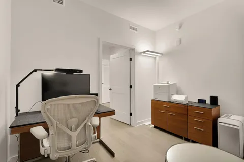 a bedroom with a bed and furniture