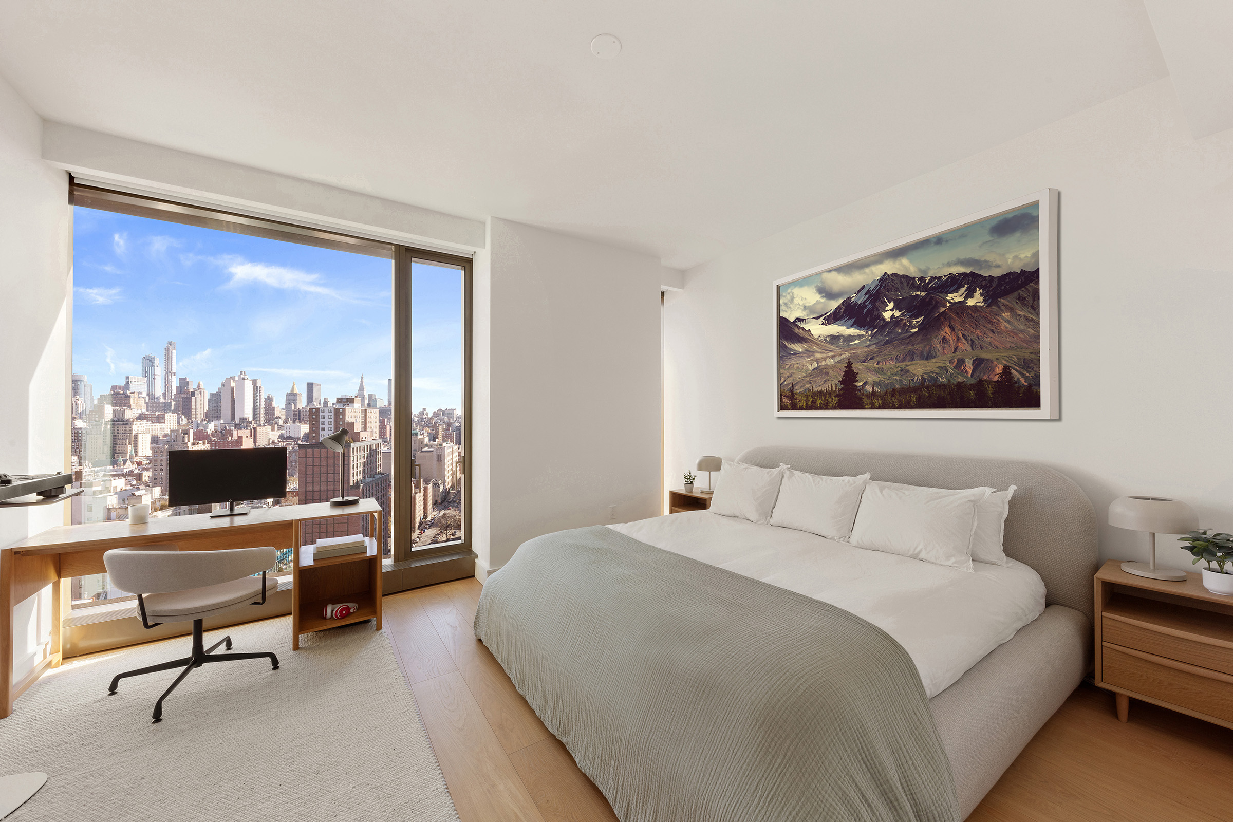 500 West 18th Street, Unit EAST 19E Manhattan, NY 10011 - Photo 7 of 18 a bedroom with a large bed and a desk