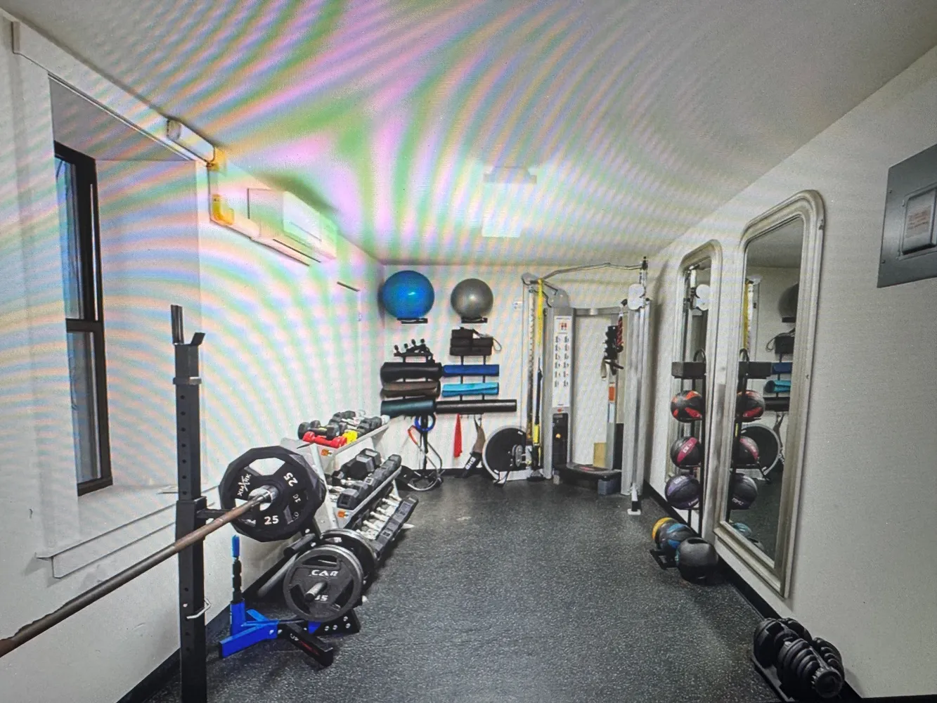 a view of a room with gym equipment