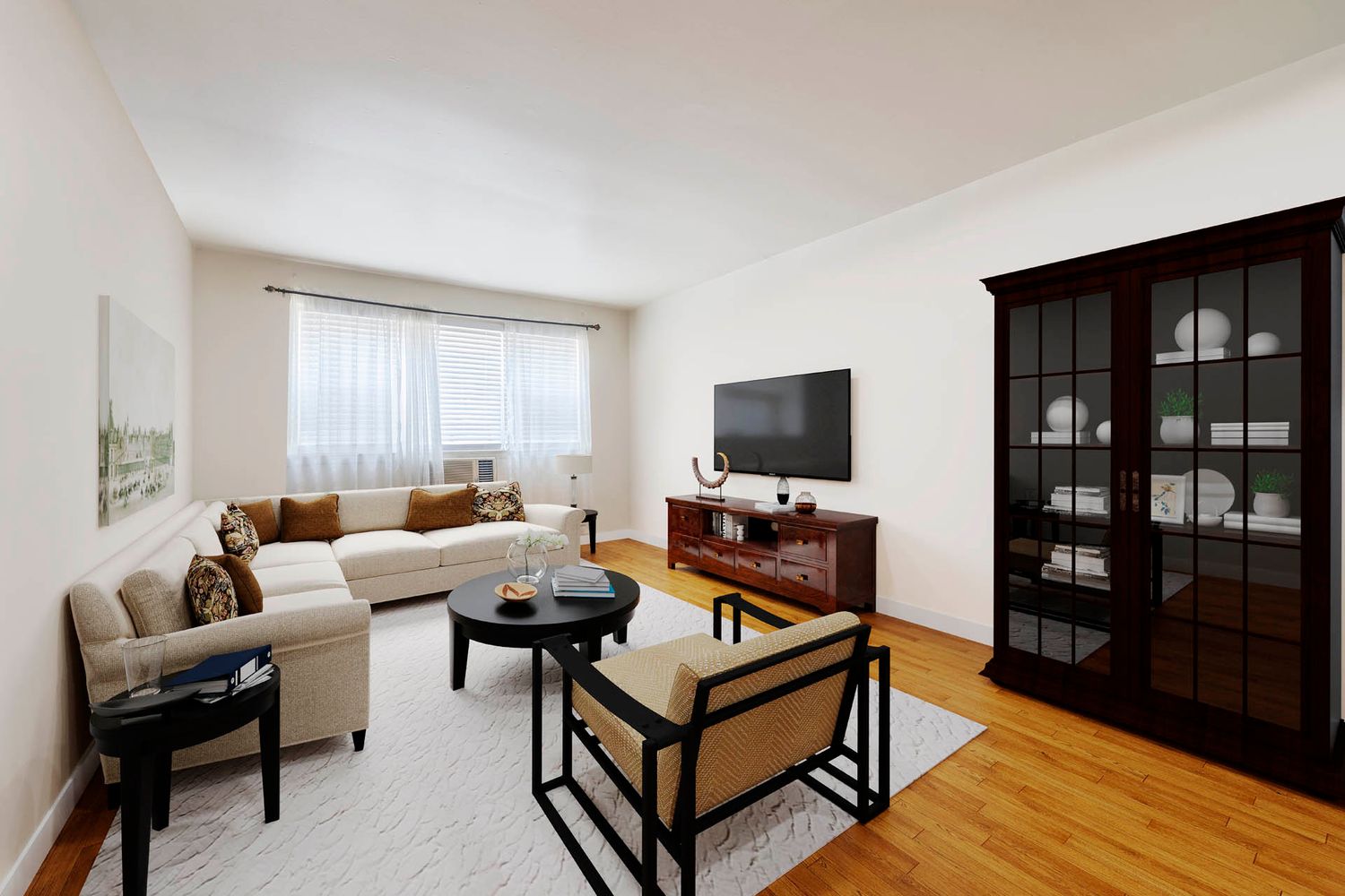 a living room with furniture and a flat screen tv