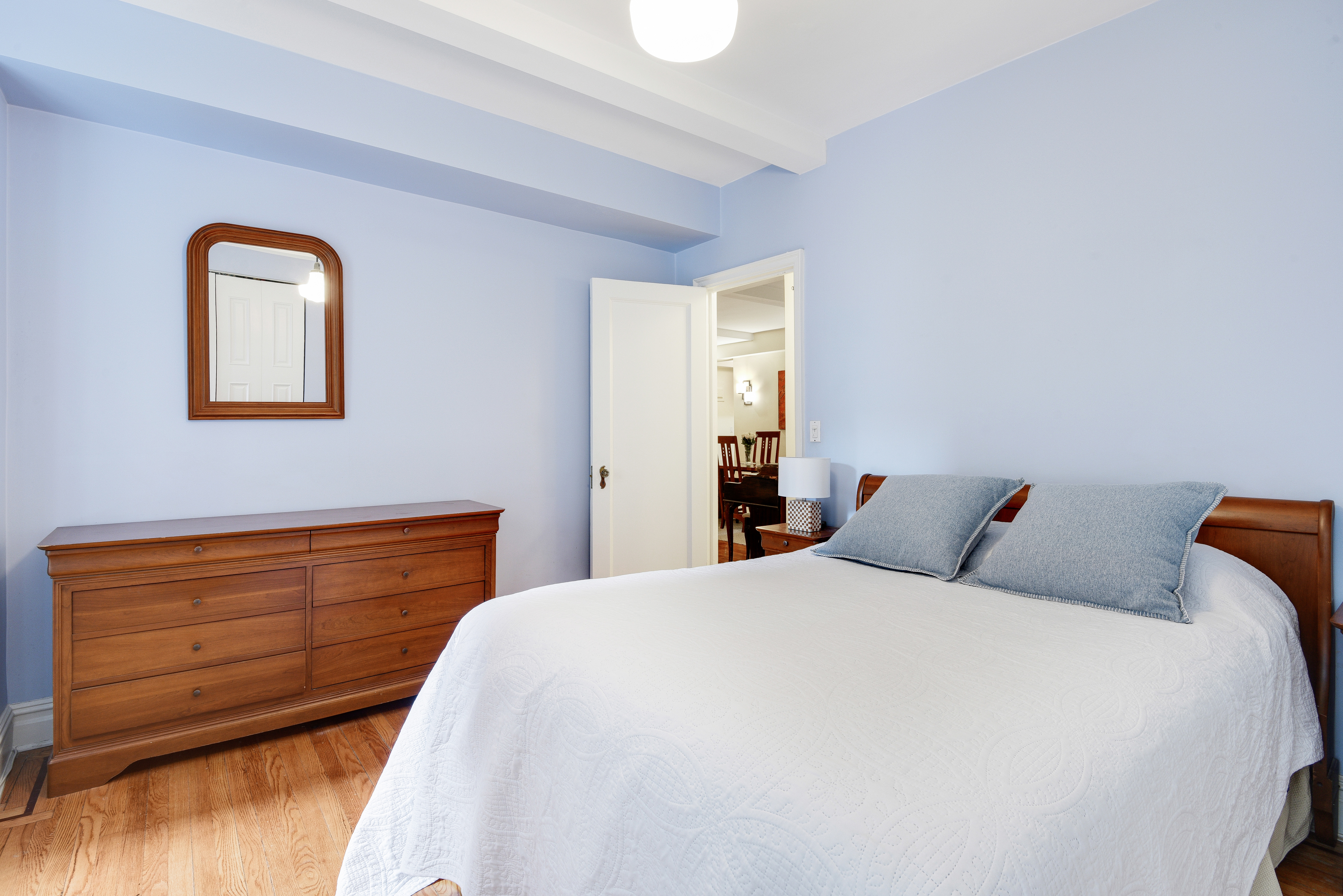 321 West 90th Street, Unit 2F/3F Manhattan, NY 10024 - Photo 7 of 15 a bedroom with a bed and a dresser