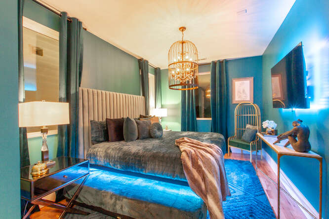 1203 Brick Church Pike Nashville, TN 37207 - Photo 23 of 44 a living room with furniture fireplace and a chandelier