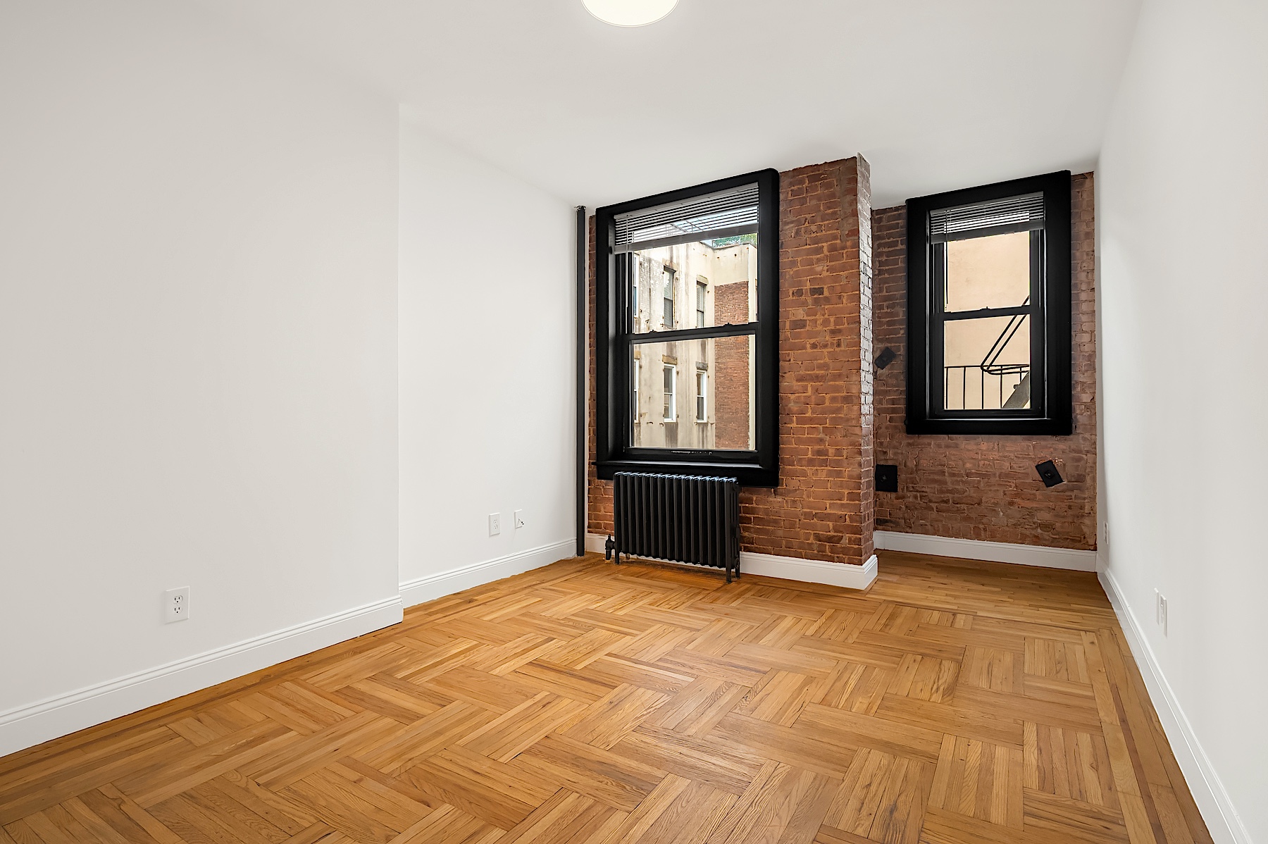 an empty room with windows