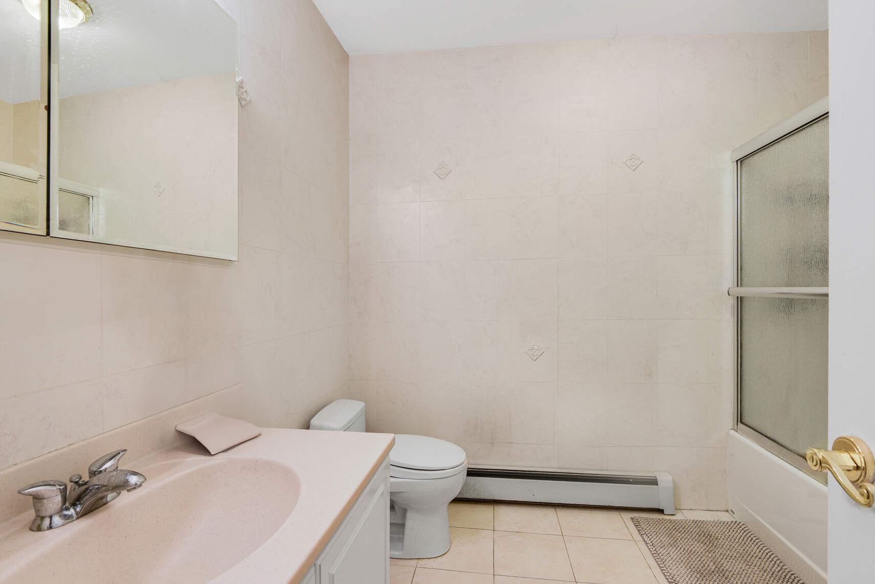 585 Warren Street, Unit 2 Brooklyn, NY 11217 - Photo 11 of 12 a bathroom with a sink and toilet