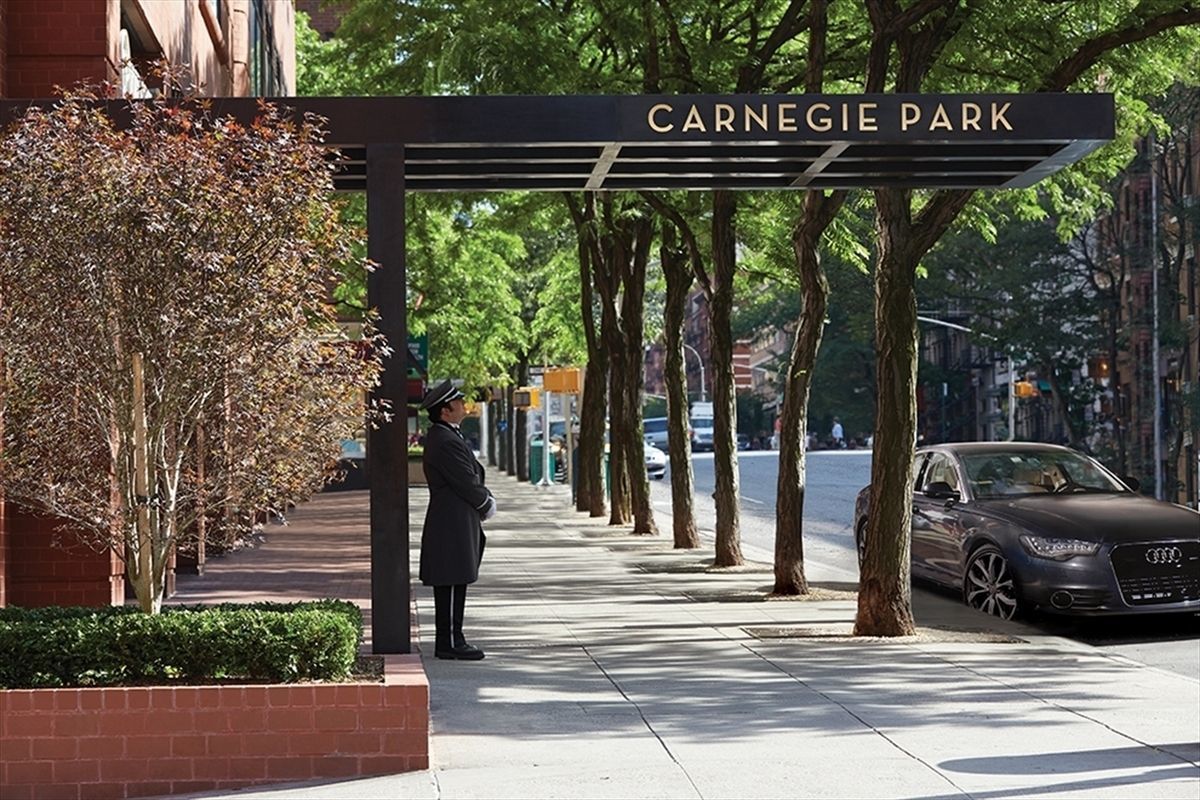 200 East 94th Street, Unit 2015 Manhattan, NY 10128 - Photo 15 of 16 a view of outdoor space and car parked