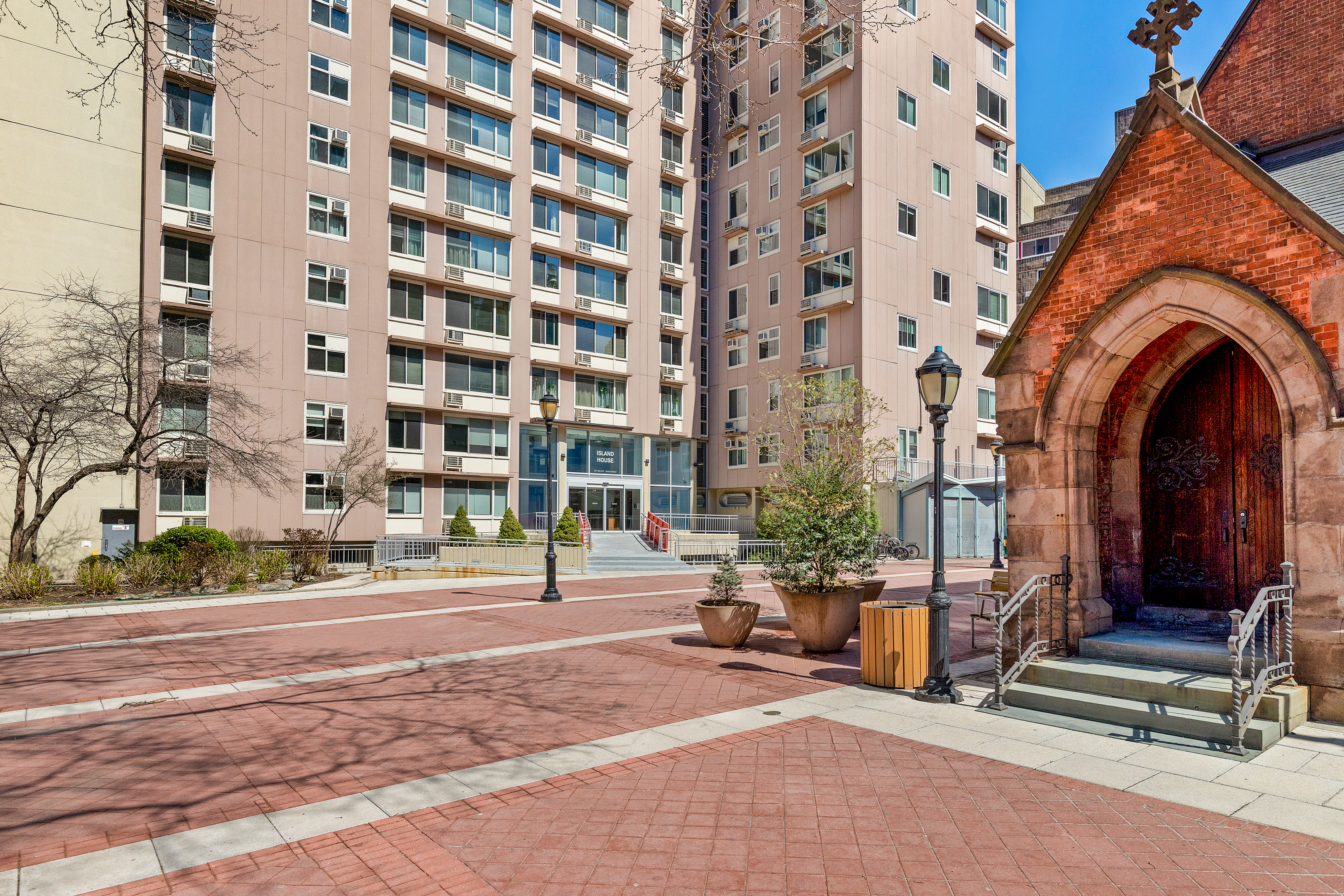 551 Main Street, Unit 208 Manhattan, NY 10044 - Photo 31 of 36 a view of a building with a street