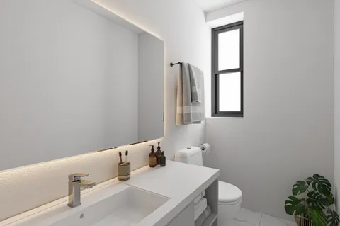 a bathroom with a sink and toilet