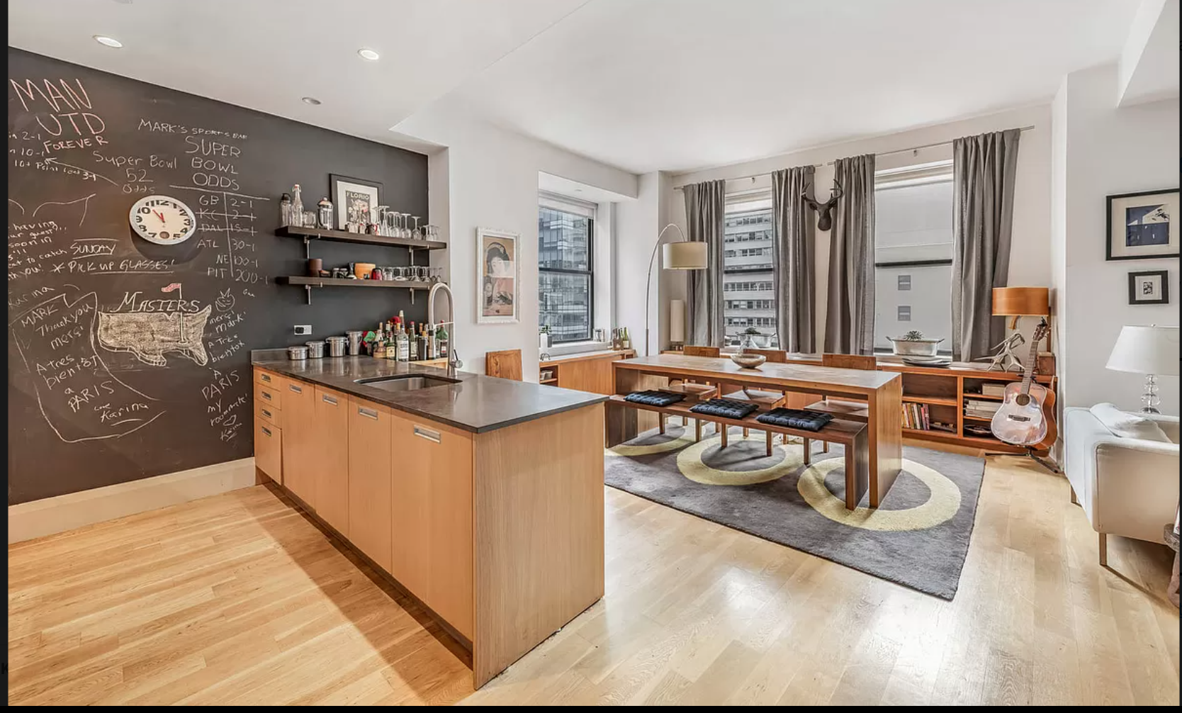 71 Nassau Street, Unit 12C Manhattan, NY 10038 - Photo 3 of 18 a living room with furniture and a wooden floor