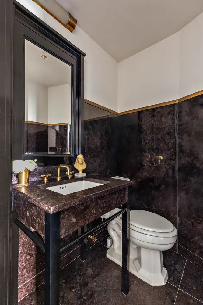 a view of a house with a table and chairs