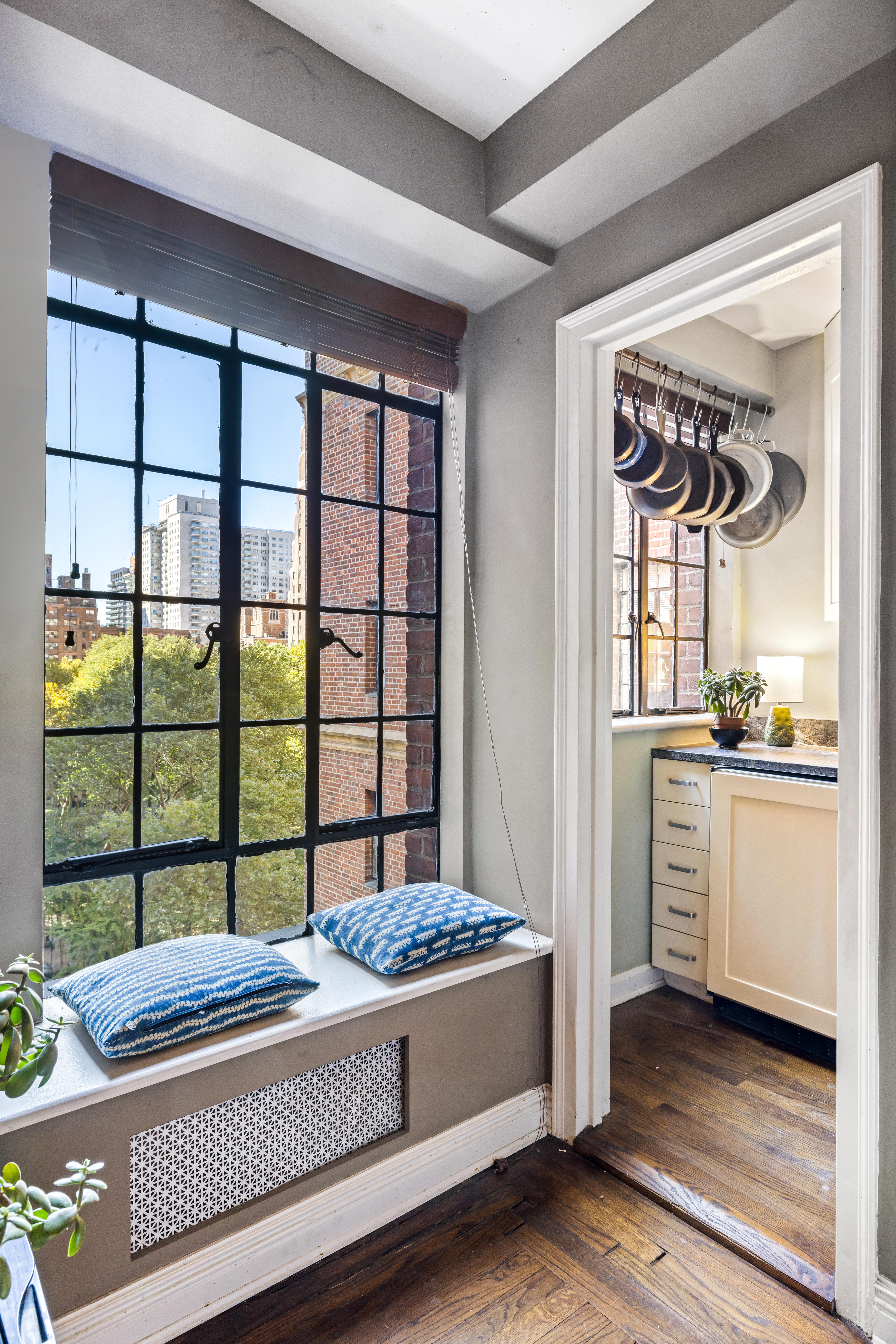 333 East 43rd Street, Unit 922 Manhattan, NY 10017 - Photo 3 of 14 a bedroom with a bed and a window