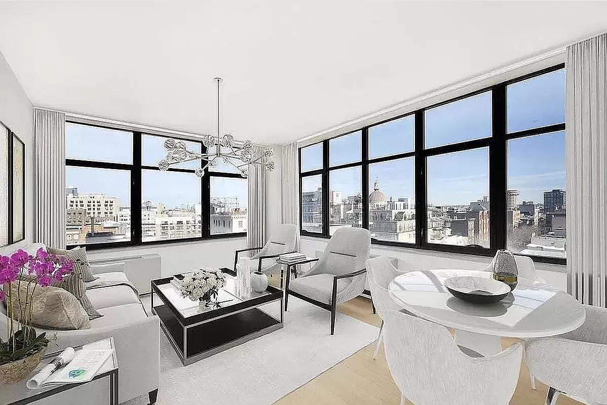 424 Bedford Avenue, Unit 19B Brooklyn, NY 11249 - Photo 1 of 11 a living room with furniture and floor to ceiling windows